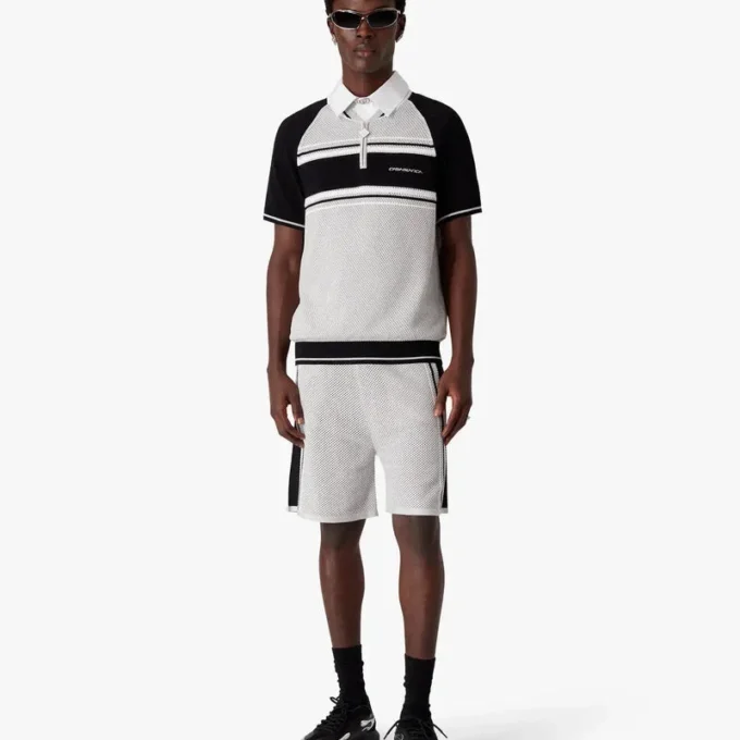 Camisas de pantalones cortos con cremallera y rayas de malla metalizada Camisas de pantalones cortos con cremallera y rayas de malla metalizada