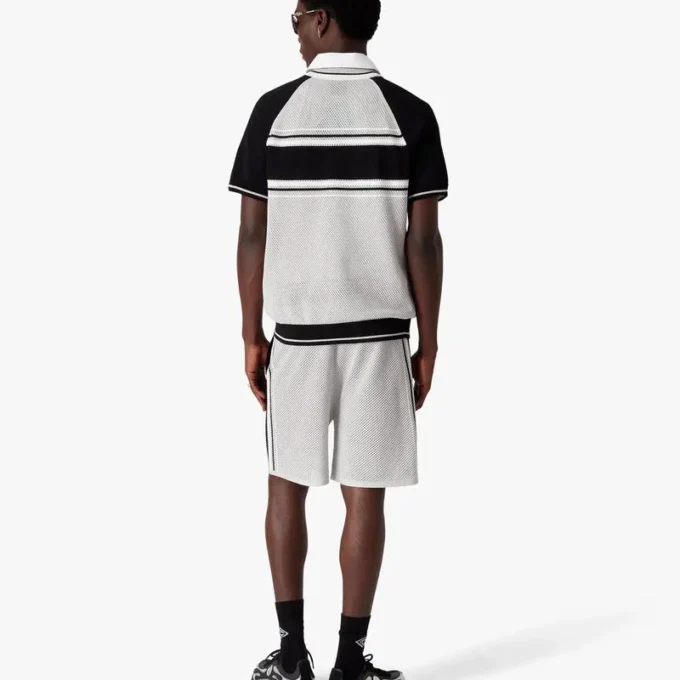 Camisas de pantalones cortos con cremallera y rayas de malla metalizada Camisas de pantalones cortos con cremallera y rayas de malla metalizada