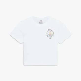 Camiseta blanca de manga corta para bebé Casa Way en pantalones cortos