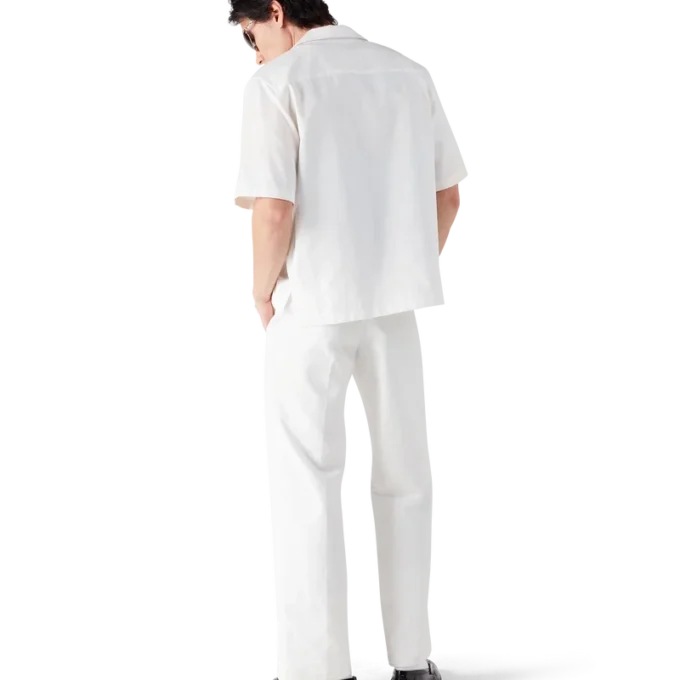 Pantalones chinos con monograma en blanco Pantalones chinos con monograma en blanco